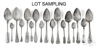 Large group of antique pewter spoons.