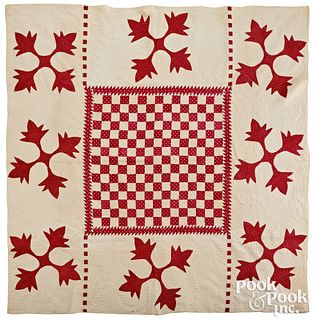 Patchwork checkerboard and appliqué quilt