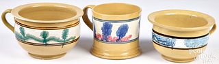 Two yellowware chamber pots and a large mug