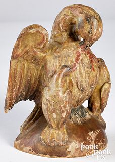 Carved and painted pine figure of a pelican