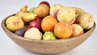 Turned wooden bowl and a group of stone fruit