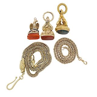 THREE ORNATE VICTORIAN FOBS, TWO CHAINS, MOST GOLD