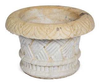 A Carved Stone Jardiniere Height 10 1/2 x diameter 15 1/2 inches.