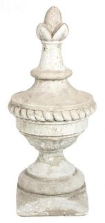 A Pair of Carved Stone Covered Urns Height 28 1/2 inches.
