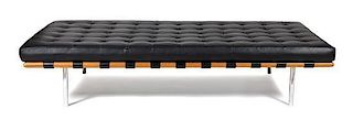 A Leather Upholstered Chromed Metal Daybed Height 17 x width 78 x depth 39 inches.