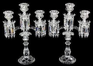 A Pair of Baccarat Glass Candelabras Height 18 inches.