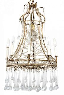 A French Empire Style Gilt Metal Nine-Light Chandelier Height 24 inches.