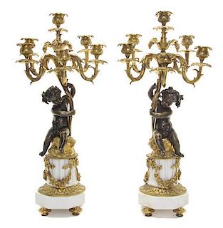 A Pair of Napoleon III Gilt Bronze and Marble Figural Six-Light Candelabra Height 23 inches.