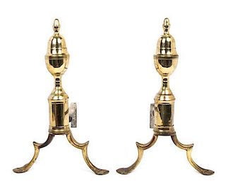 A Pair of Brass Andirons Height 14 1/2 inches.
