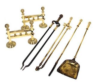 A Collection of Brass Fireplace Tools Height of stands 8 inches.