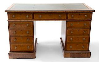 A William IV Burl Walnut Kneehole Desk Height 29 x width 47 1/2 x depth 24 inches.