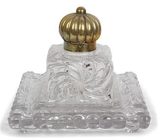 An English Molded Glass Inkwell on Square Base Height 7 1/4 x width 8 3/8 inches.