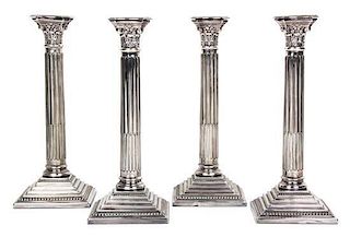 Four Silver-Plate Columnar-Form Candlesticks Height 12 1/2 inches.