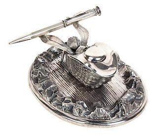 An English Silver-Plated Nautilus Form Inkwell on Stand Height 3 x width 6 1/2 inches.