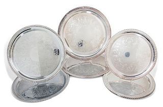 Eight Silver-Plate Circular Serving Trays Diameter of largest 16 inches.