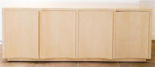 A Beige-Lacquered Four-Door Console Cabinet Height 32 1/2 x width 84 x depth 20 inches.