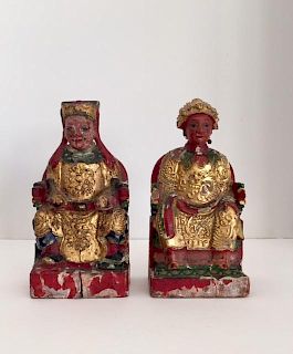 A Pair of Chinese Parcel-Gilt and Polychrome-Painted Carved Wooden Figures Height 8 inches.