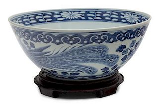 A Chinese Blue and White Decorated Bowl Height 6 x diameter 12 inches.