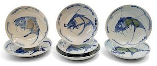 A Group of Seven Chinese Blue and White Decorated Plates Diameter 8 1/2 inches.