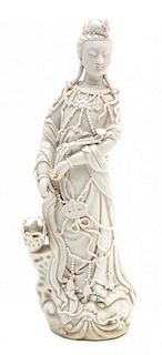 A Chinese Blanc-De-Chine Figure of Guanyin Height 10 1/2 inches.