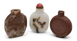 A Group of Three Chinese Snuff Bottles Height of tallest 2 3/4 inches.