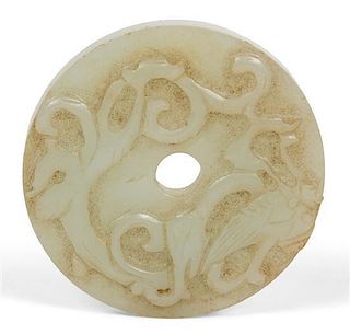 A Chinese Carved Jade Bi Disc Diameter 2 1/4 inches.