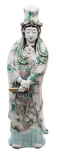 A Japanese Polychrome and Gilt Decorated Porcelain Figure Height 30 inches.
