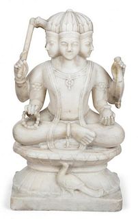 An Indian Carved Marble Figure of the God Braham Height 15 1/2 inches.