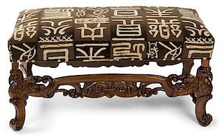 A Provincial Style Carved Walnut Bench Height 19 x width 36 x depth 16 inches.