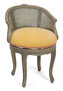 A Louis XV Cane Back Vanity Chair Height 28 1/2 inches.
