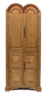 A Continental Carved Pine Corner Cabinet Height 81 x width 32 1/2 x depth 14 inches.
