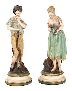 A Pair of Italian Ceramic Figures Height 11 1/2 inches.