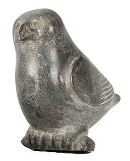 An Inuit Carved Stone Figure Height 4 3/4 inches.