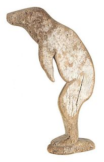A Carved Whale Bone Figure Height 13 inches.