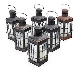 A Collection of Six Metal Oil Lanterns Height 12 inches.