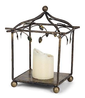 A Gilt Metal Candle Holder With Leaf Motif Height 14 inches.