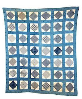 An American Pennsylvania Blue and White Patchwork Quilt 74 x 66 inches.