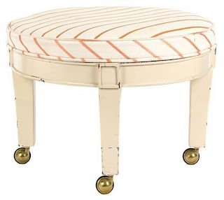An Upholstered Foot Stool Height 13 x diameter 17 inches.