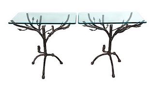 A Pair of Cast Metal and Glass Side Tables Height 26 x width 28 x depth 16 inches.