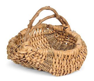 A Group of Miscellaneous Basketware Height of basket 14 inches.