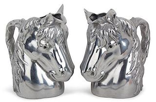 A Pair of Cast Aluminum Horse Head Pitchers Height 10 inches.