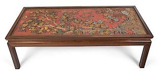A Painted Lacquer Carved Panel Table Height 17 x width 55 x depth 25 1/2 inches.