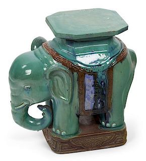 A Glazed Ceramic Elephant Form Side Table Height 18 1/4 inches.