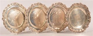 Set of Four Sterling Silver Plates, 84.5 troy ozs.
