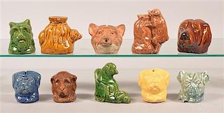Ten Ceramic and Pottery Animal Bust Still Banks.