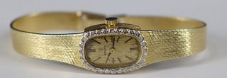 JEWELRY. Lady's Omega 14kt Gold and Diamond