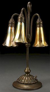 A TIFFANY STUDIOS ETCHED BRONZE LILY LAMP