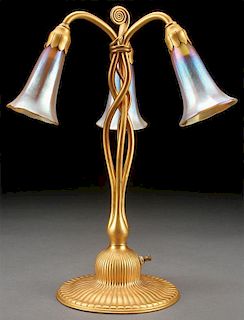 A FINE TIFFANY STUDIOS GILT BRONZE LILY LAMP