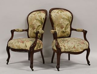 An Antique Pair Of Louis XV Style Arm Chairs.