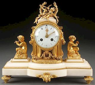 A FRENCH LOUIS XVI STYLE GILT BRONZE AND MARBLE
